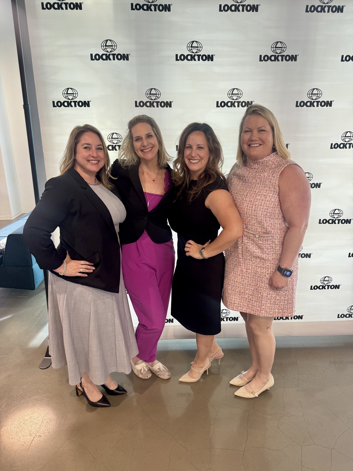 Laura with fellow leaders at a Lockton event