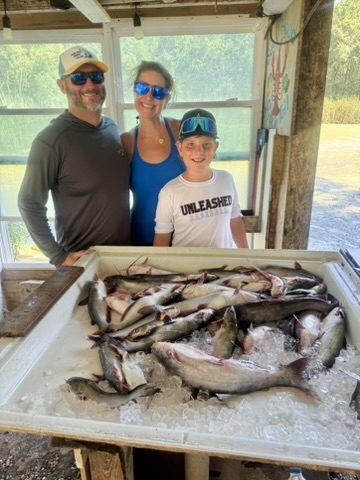 Laura's family on a fishing trip
