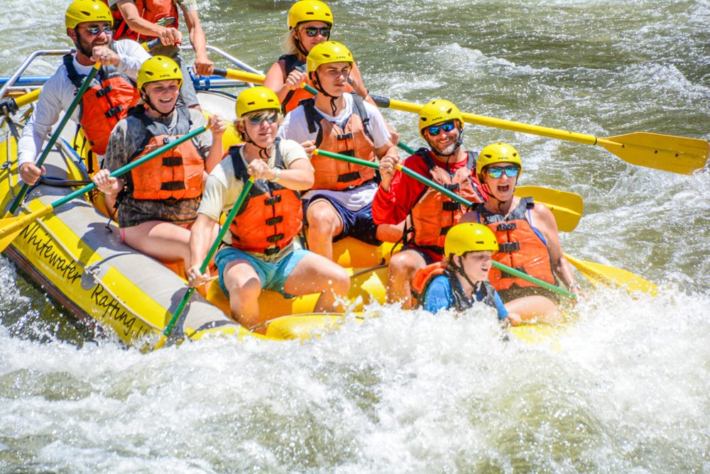 Laura and family whitewater rafting